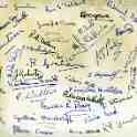 Autographs on back of form 5A photo